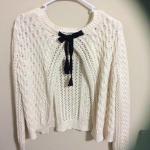 Open Back Sweater with a Black Tie